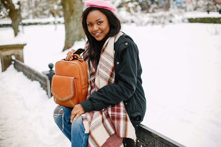 picture showing solo traveler with her durable packback 