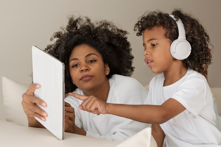 picture showing mum educating her child on online safety and screen time