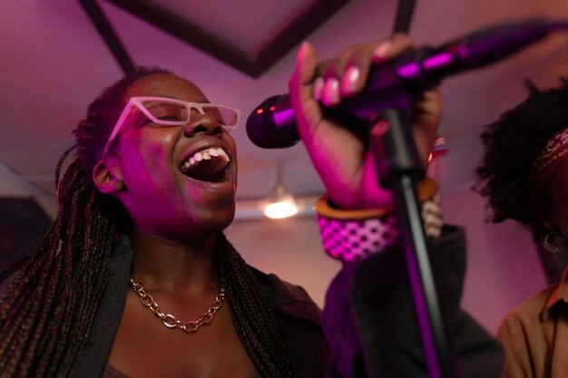 picture showing a lady at a local Karaoke bar