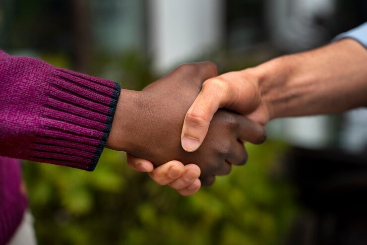 picture showing people shaking hands in trust