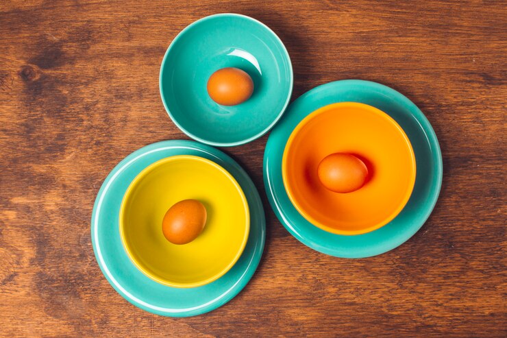 picture showing eggs in seperate bowls as a strategy for investments