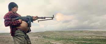 picture showing a pregnant woman wielding a lethal weapon