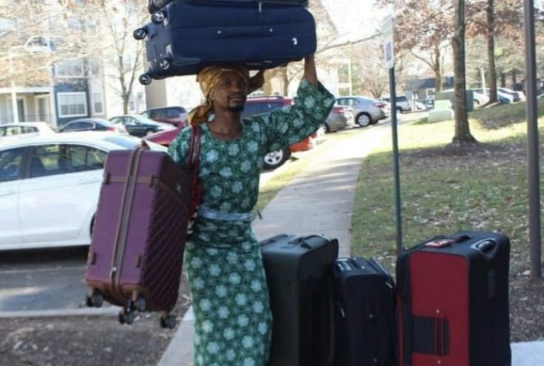 Nigerian with overpacked boxes